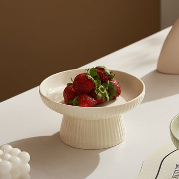 Creamy ceramic fruit dish