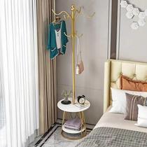 Bedside table with coat rack integrated into the floor-standing master bedroom a light and luxurious artifact to store clothes on the side for a high-looking alternative at night