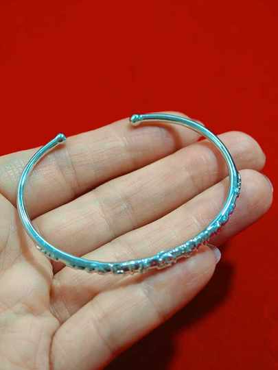 La pulsera LP especial Taitai que sostiene a Jin Jin es igual a 0,5 kg que sostiene la apertura de la pulsera de plata