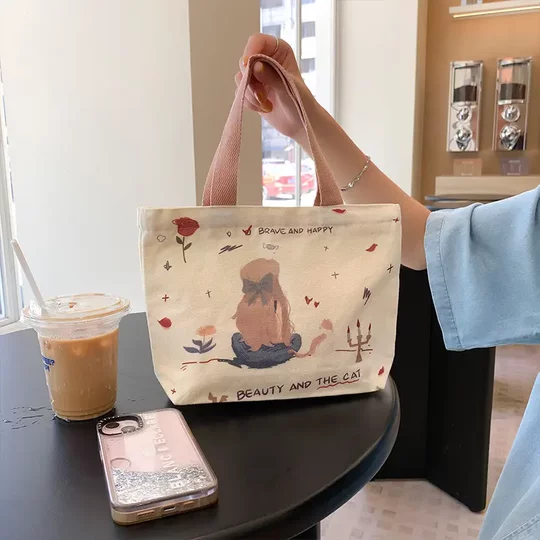 帆布包女卡通帆布手拎包小挎包包ins韩版可爱休闲手提包