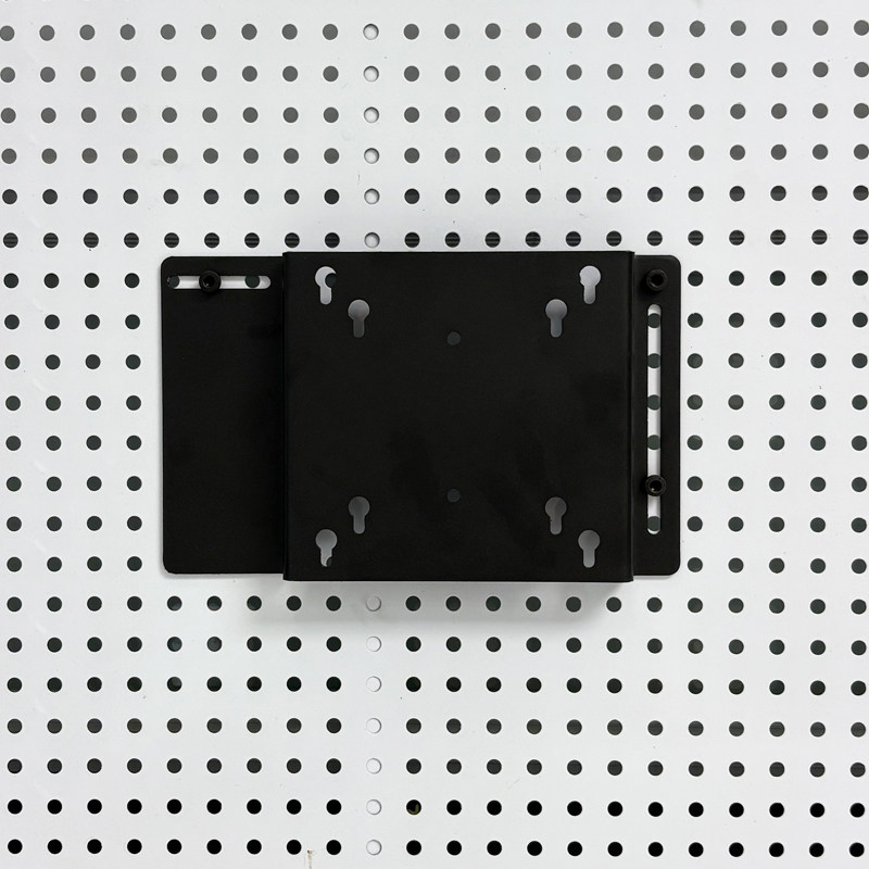 Perforated board computer screen stand saves space