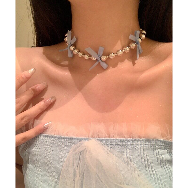 Instagram-worthy ballet-inspired metallic beaded ribbon bow choker, a sweet and unique design necklace, and a Korean-style choker.