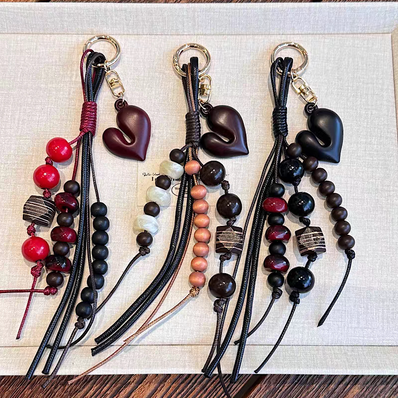 Heart-Shaped Wooden Bead Tassel Bag Pendant for Women, High-End Backpack Accessory, Woven Decoration, Niche Accessory Bag Charm Heart-Shaped Wooden Bead Tassel Bag Pendant for Women, High-End Backpack Accessory, Woven Decoration, Niche Accessory Bag Charm