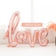 2 соединенных розовых золота LOVE