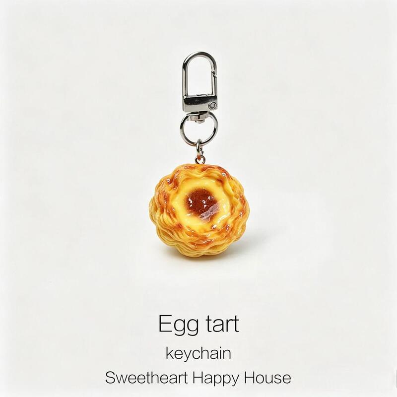 Crispy Layered Egg Tart Keychain, Creative and Cute Food Toy, Resin Pendant, Backpack Decoration, Gift for Friends Crispy Layered Egg Tart Keychain, Creative and Cute Food Toy, Resin Pendant, Backpack Decoration, Gift for Friends