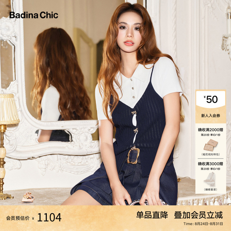 Badinachic Dark Blue Polo Collar Short-Sleeved Knit Top with a Fake Two-Piece Design, Bow Knot, and Delicate Hollow-Out Details