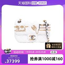 ()Old and new classic flap bag with large gold and silver badge in white