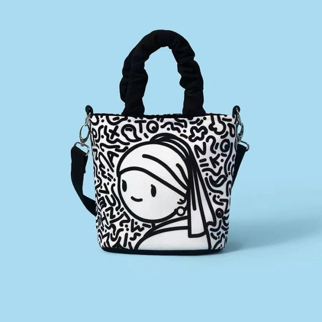 2025 new cartoon graffiti slanted canvas bag out