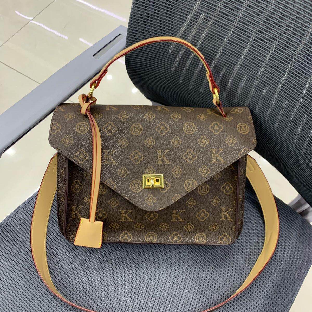 чемодан 手提斜挎两用女包2025新款女包高级时尚百搭邮差包单肩老花大容量