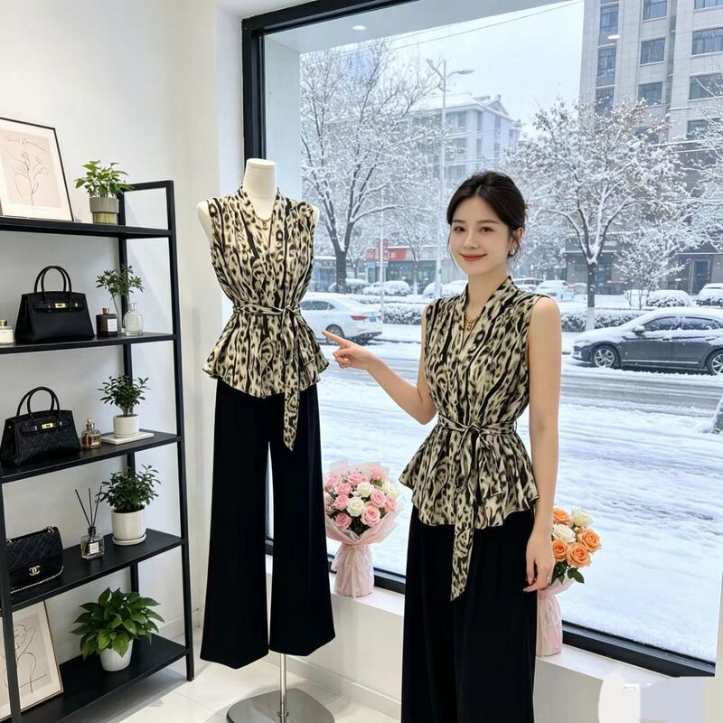 French V-Neck Cross-Over Retro Print Sleeveless Shirt for Women, Summer Top with Irregular Design and Waist-Tie Design French V-Neck Cross-Over Retro Print Sleeveless Shirt for Women, Summer Top with Irregular Design and Waist-Tie Design