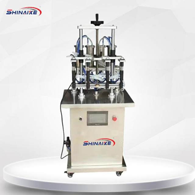 Four-head vacuum negative pressure perfume filling machine glass bottle automatic filling machine liquid filling machine