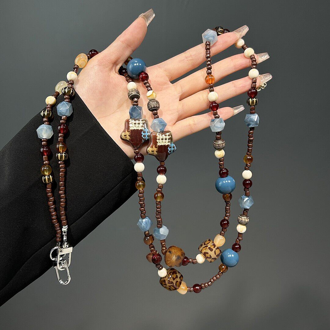 Japanese DEMIU crossbody/back strap phone charm 2026 Maillard colorful five-pointed star leopard print beaded pendant pad