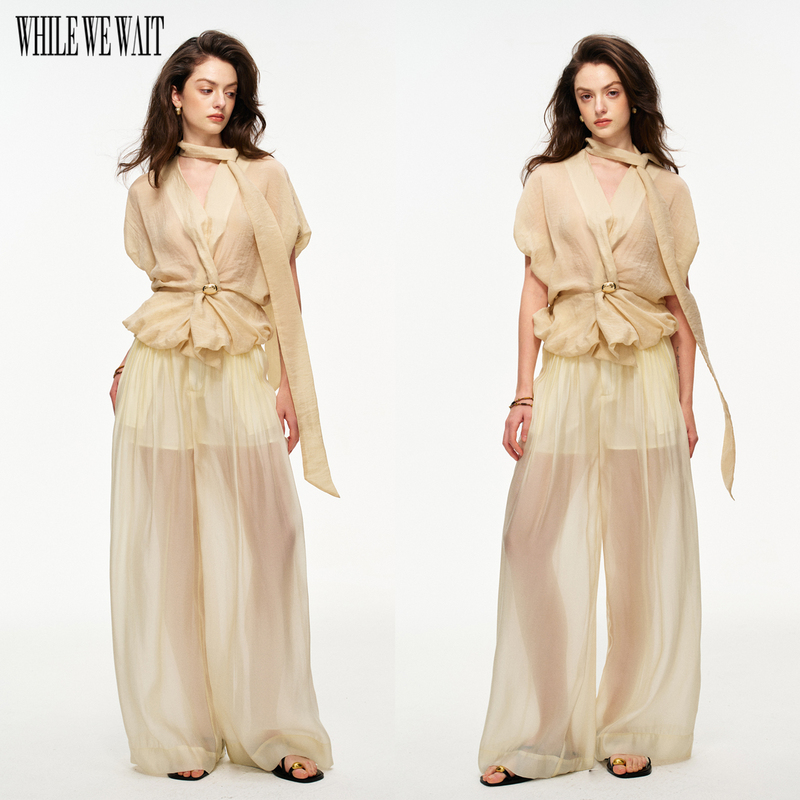 While We Wait Irregularly Designed Knot-Waist Floral Ruffle Short-Sleeve Top Shirt with Brooch Included While We Wait Irregularly Designed Knot-Waist Floral Ruffle Short-Sleeve Top Shirt with Brooch Included