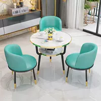 Голубой глянцевый кожаный стол и три стула