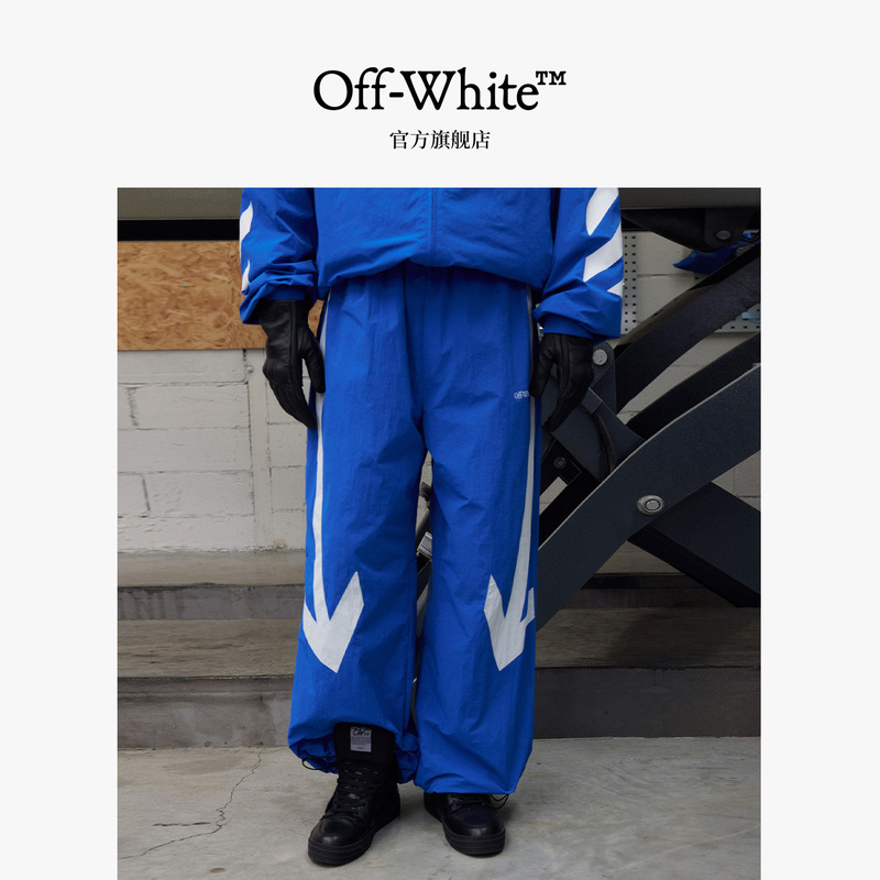 Off-White ™ [Same Style as Zhang Yixing] Couple's Matching Arrow-Decorated Casual Pants, Loose Long Pants for Men and Women.