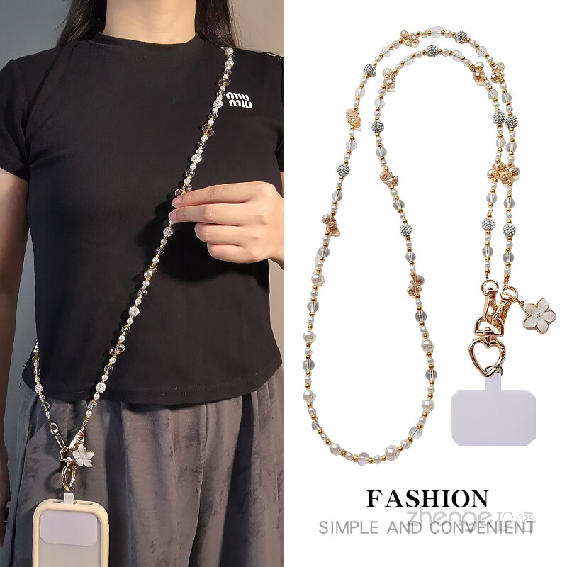 Long crossbody phone strap with crystal and pearl design, can be worn as a shoulder strap, exquisite and high-end outdoor travel bag chain case, super stylish and versatile new product.