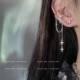 Sparkling Diamond Star Tassel Ear Clips for Women, Trendy Niche High-End Light Luxury Retro Integrated Non-Pierced Ear Cuffs