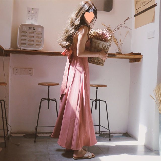Summer temperament dress ສີດໍາພຽງເລັກນ້ອຍຫາດຊາຍຫາດຊາຍໃນວັນພັກ fairy scheming backless slim ແອວສູງ suspender ຍາວ dress