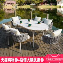 Outdoor table and chair courtyard balcony outdoor Nordic leisure rock board table and chair combination terrace garden waterproof Sun-proof rattan chair
