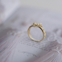 Oath Japanese light luxury hollow lace bow ring fashion plated 14K gold Food ring simple