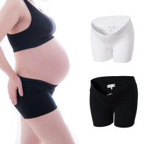 Pregnant woman mommy photographed writing true underwear to hit bottom sleep pure color smear harnesses black and white vests