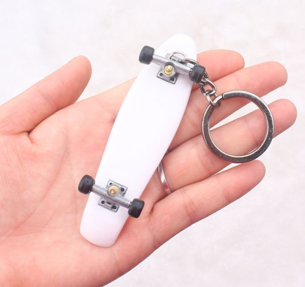 Single cocked hình con cá nhỏ ngón tay ván trượt túi móc treo điện thoại di động mặt dây ngón tay đồ chơi tuổi teen - Trượt băng / Trượt / Thể thao mạo hiểm mũ bảo hiểm xe đạp thể thao