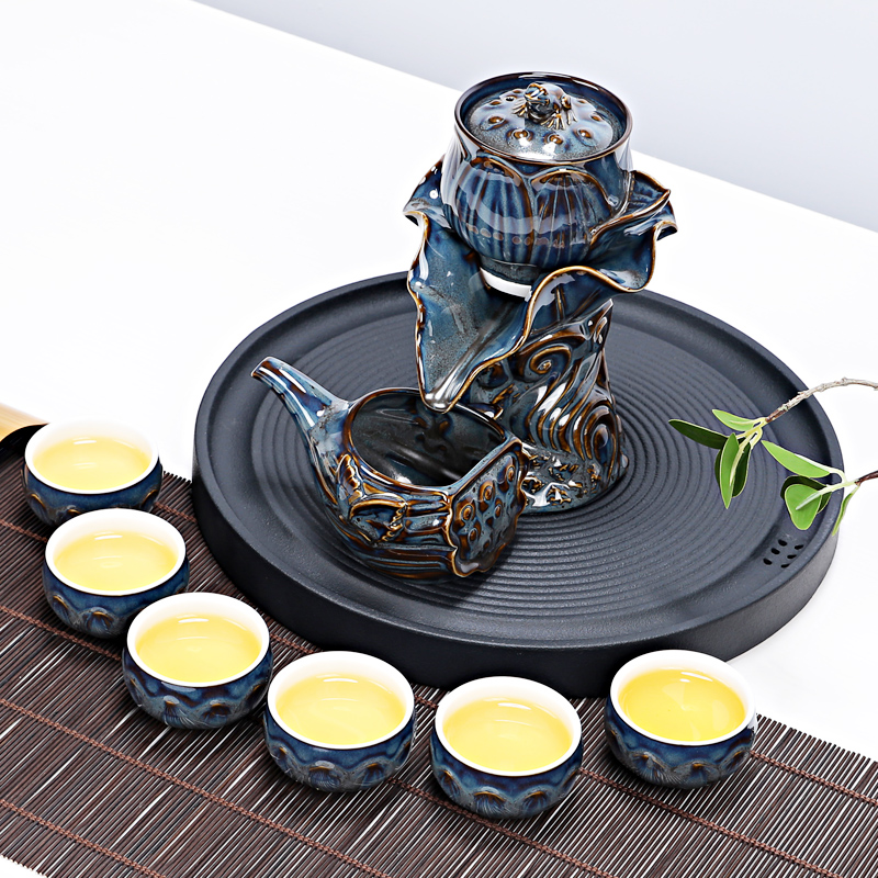 Lotus half automatic kung fu tea set ceramic household lazy creative tea teapot teacup of a complete set of millstones