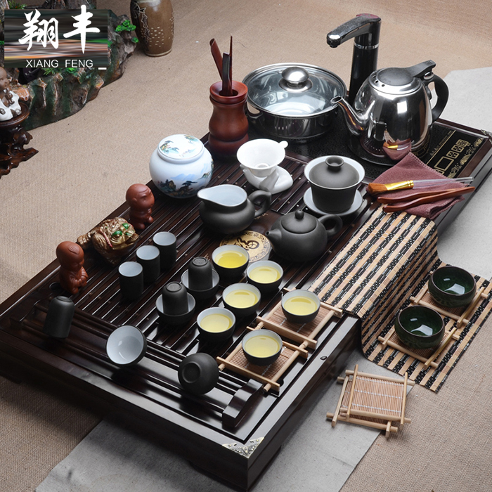 Xiang feng tea set tea service of a complete set of kung fu tea set purple four unity induction cooker solid wood tea tray