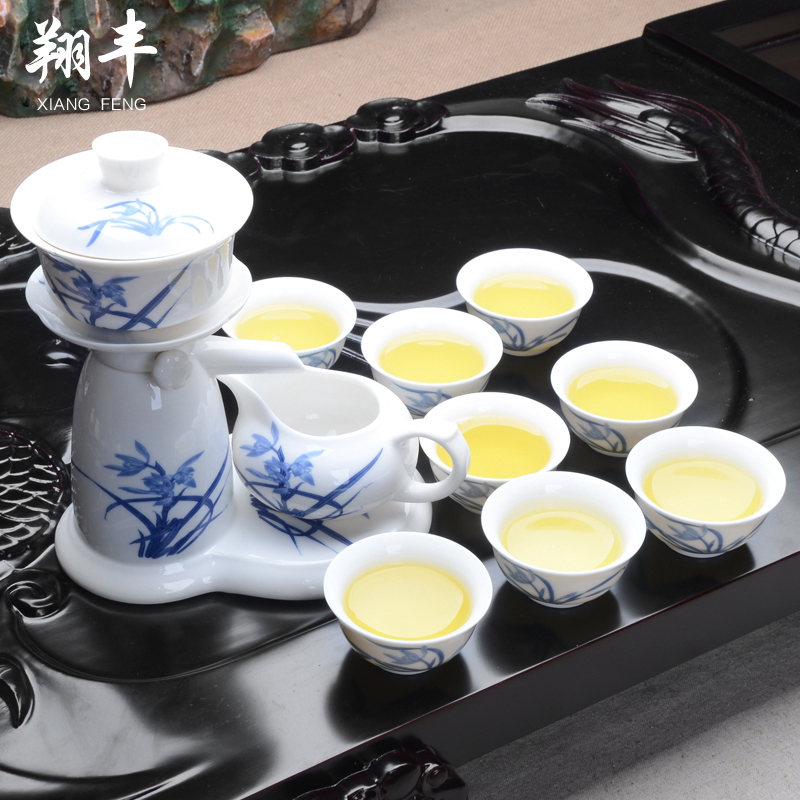 Xiang feng kung fu tea set semi - automatic artesian water of blue and white porcelain porcelain tea sets ceramic gifts