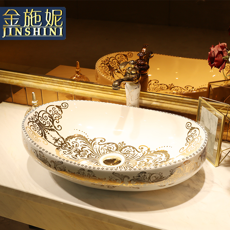 Gold cellnique continental basin bathroom sink installed on the square of the basin that wash a face basin art ceramic wash basin