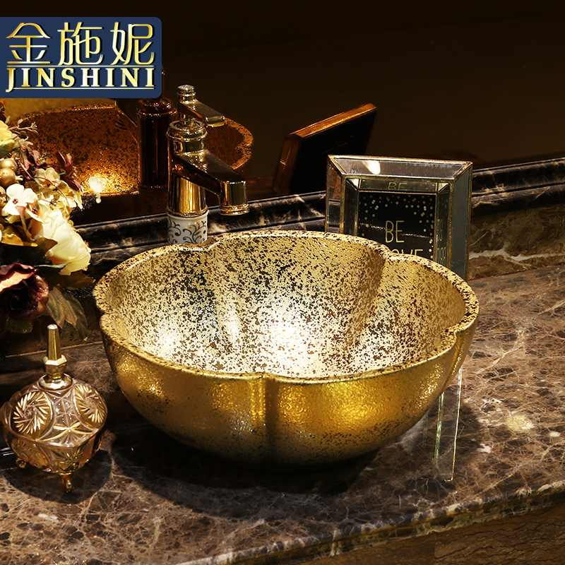 The gold - plated cellnique European - style bathroom sink stage basin gold silver ceramic basin bathroom sinks