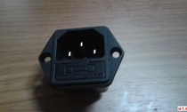 Ac power outlet element with fuse strap fixing ear folding copper feet