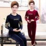 Quần áo mùa thu mẹ tải xuân nữ trung niên 40 tuổi 50 bộ đồ nhung vàng trung niên phù hợp với thể thao nữ cỡ lớn áo kiểu trung niên sang trọng