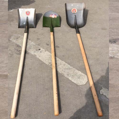 Home renovation work with steel shovel iron sweep for large red barrels 5 gold tools