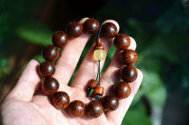 Authentic Hainan Huanghuali oil pear old material full tiger skin pattern 1 5 sea yellow hand string grimace to the eye Buddha beads bracelet wood