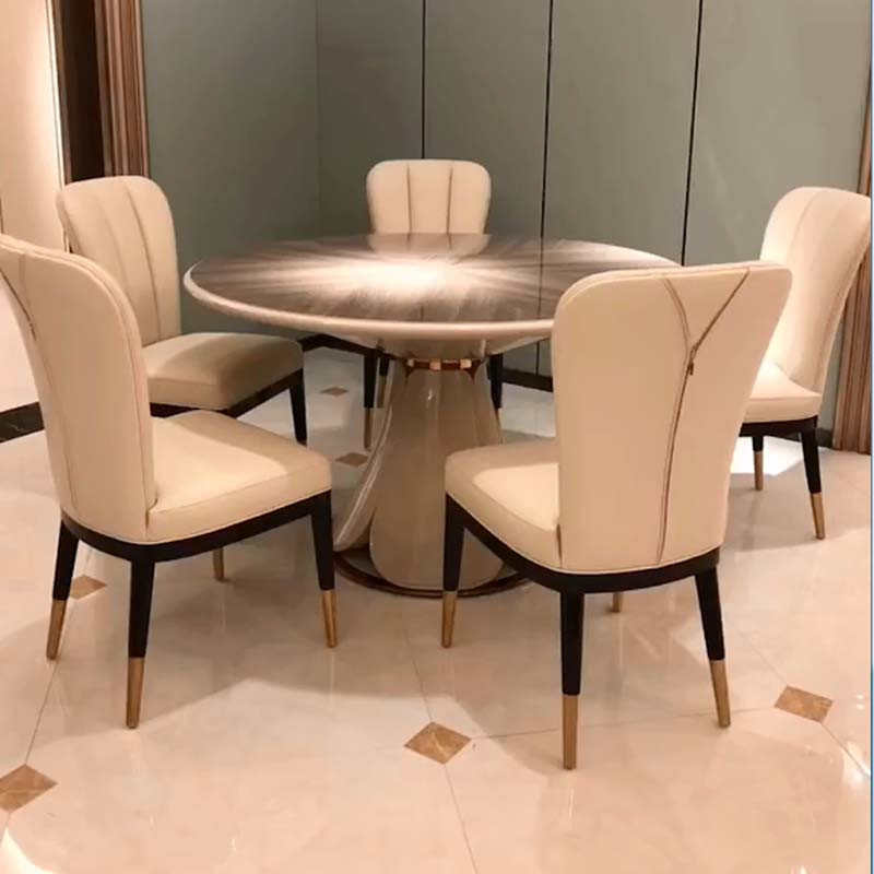 Light and luxurious solid wood round table modern dining table and chairs combined with Bentley genuine leather dining chair small family type minimalist dining room furniture