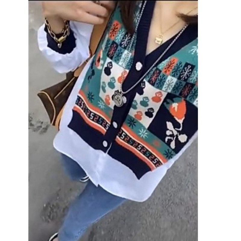 2022 early autumn new Korean version shirt design sense niche stitching fake two-piece long-sleeved cardigan knitted jacket women's thin