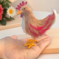 Птенец из натуральной кожи и шерсти, рост около 10см.