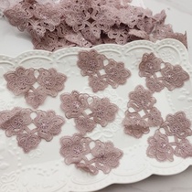 3204 A pack of about 58 purple and pink bright silk water-soluble flower stickers