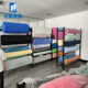 Textile fabric sample display rack custom clothes roll fabric ຕົວຢ່າງ fabric rack elevator floor stand