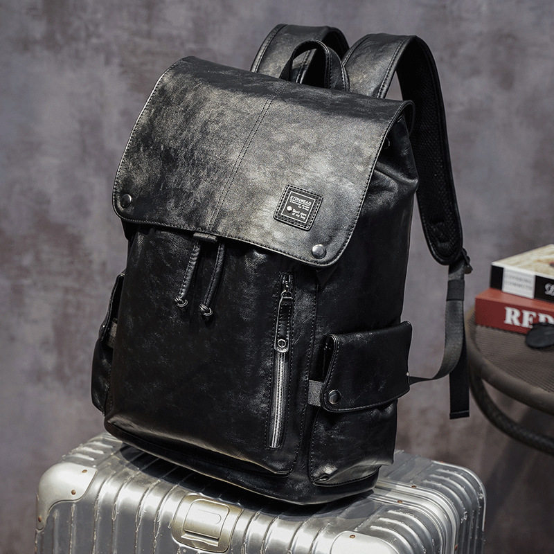 Hong Kong's new student school bag computer bag genuine leather rear shoulder bag men's trend scapegoat for men's Korean version travel bag