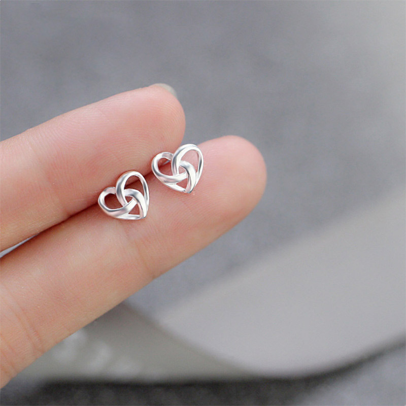 The new S925 pure silver Han edition winding the loving ear needle with irregular peach - shaped headdress