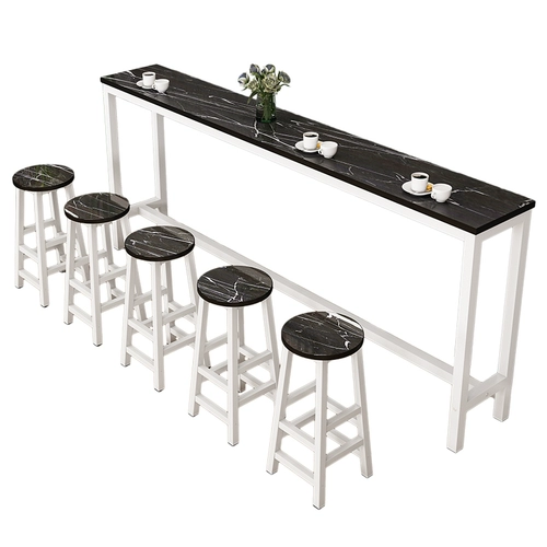 Заблокирован стеной, столом, домашним балконом, столом для чая с молоком и стулом комбинированного коммерческого длинного стола с высоким содержанием ноги с узким столом.