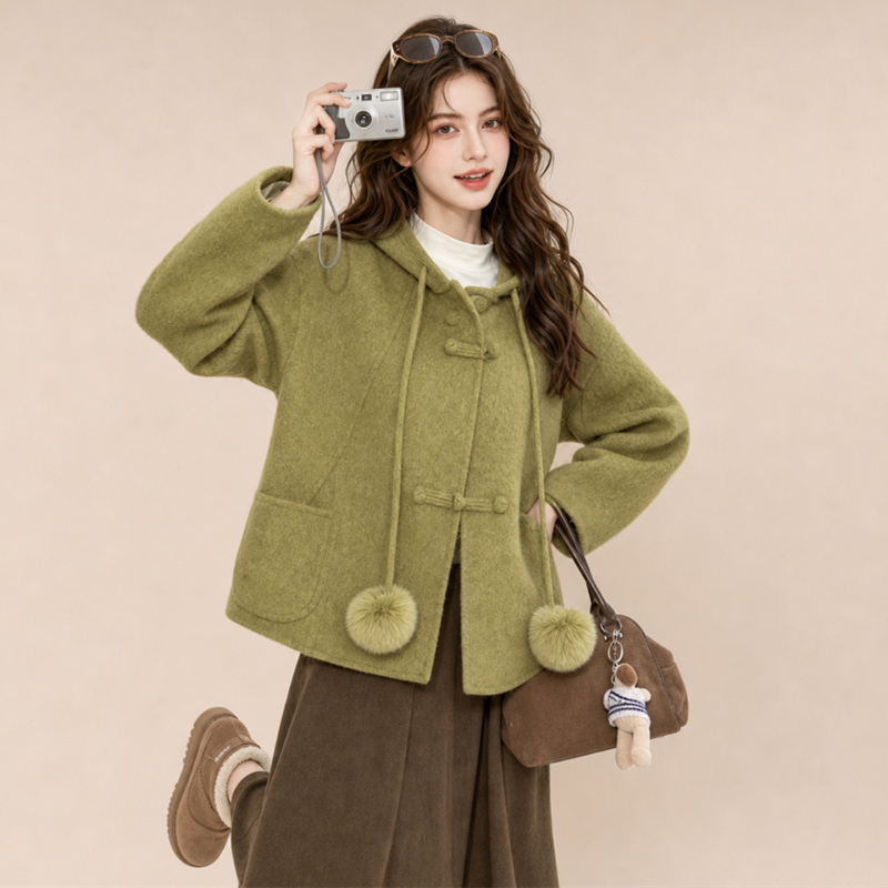 Monzi Avocado Green Elegant Wool Double-Sided Short Coat for Women, New Winter Style, Loose Hooded Coat with Pom-Poms