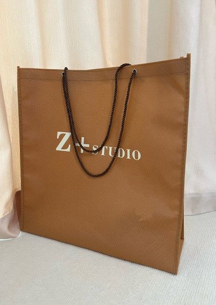 Non-woven bag custom clothing shopbag printing LOGO personality cotton rope three strands of rope with hand-held customization