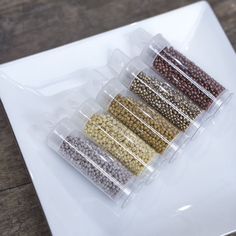 Method embroidered nail pearl material clothing accessories 2mm meter pearl round pearl porcelain pearl earth color series 5 color into 10g bottle