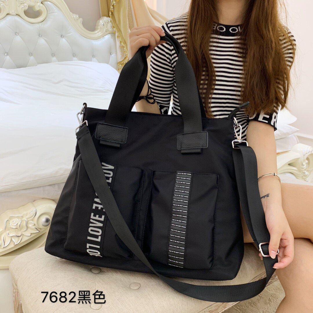 Travel bag, handheld capacious bag strap one shoulder