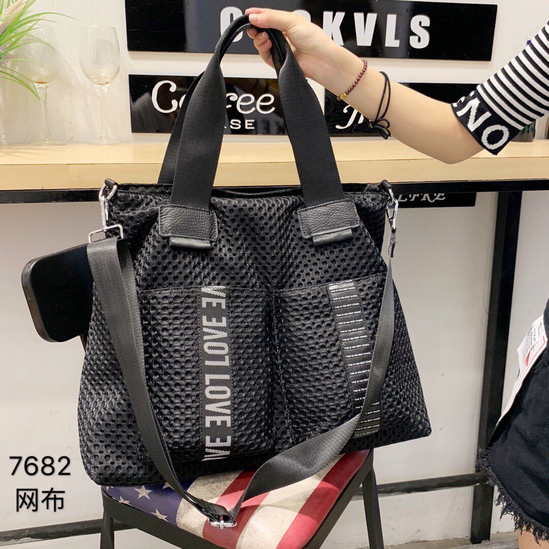 Travel bag, handheld capacious bag strap one shoulder