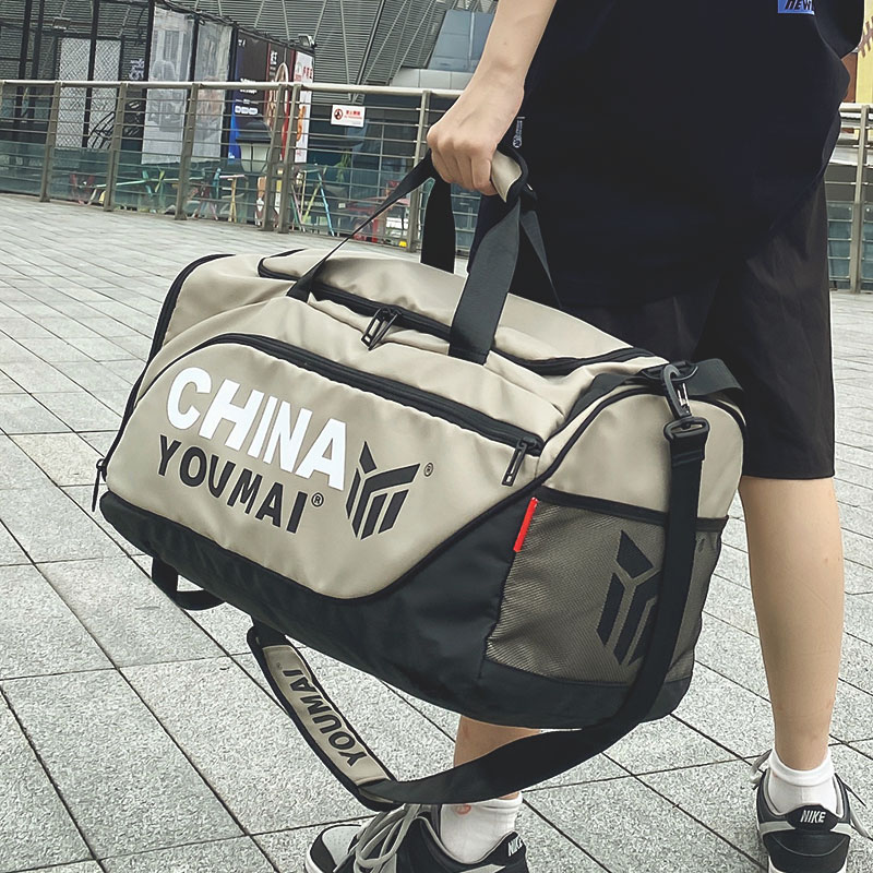 Travel bag women's oversized capacity light short trip duffel bag hand storage bag fitness bag male dry and wet separation