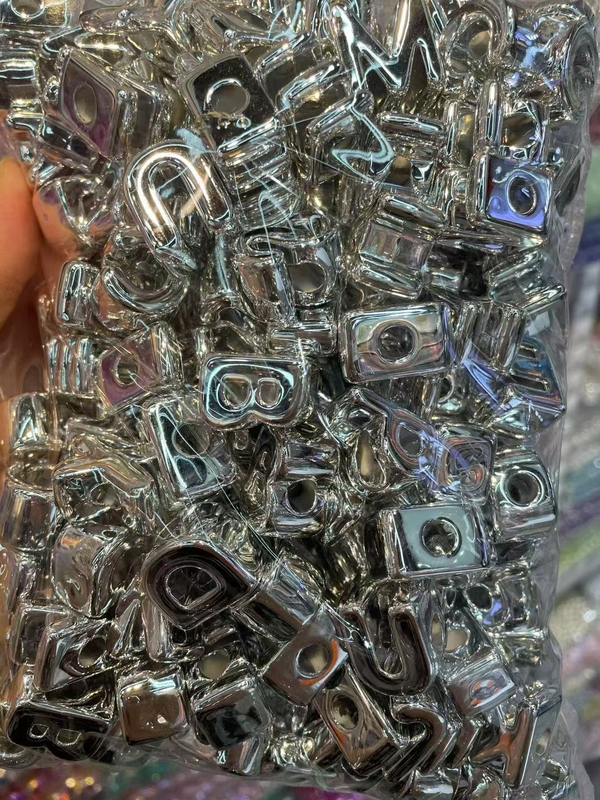 A Pack of Silver Acrylic Letter Beads Contains about 100 Pieces A Pack of Silver Acrylic Letter Beads Contains about 100 Pieces